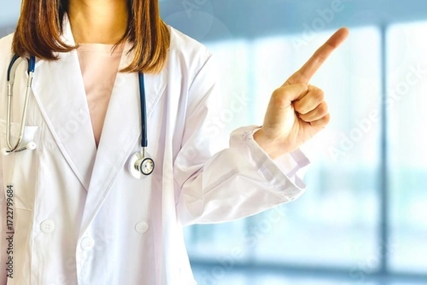 Fototapeta 指差しする女性医療従事者