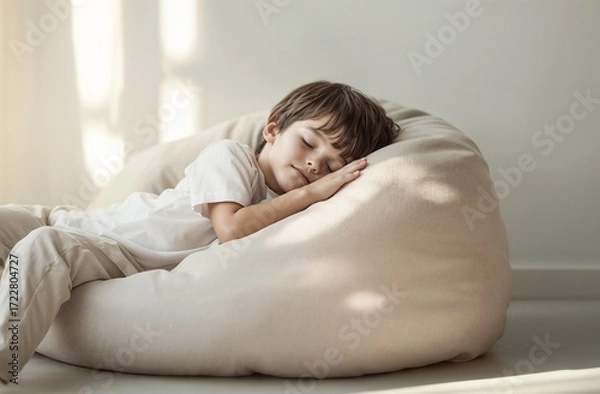 Fototapeta Boy sleeping peacefully on soft beanbag in minimalistic room, advertising of children's furniture, posts about children's sleep, visual for parental blogs, 
