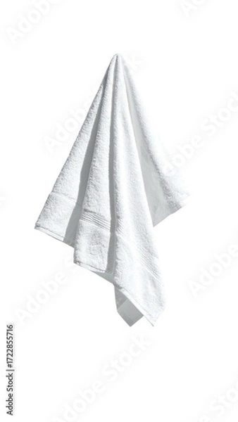 Fototapeta A white cloth towel hangs, draped and folded