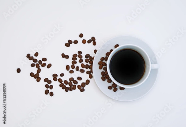 Obraz Close-up a cup of coffee with a base, coffee beans, refreshing, white background