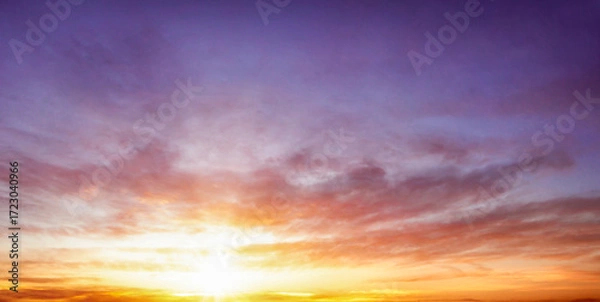 Fototapeta Sunset sky background. Panoramic view of sunset sky.
