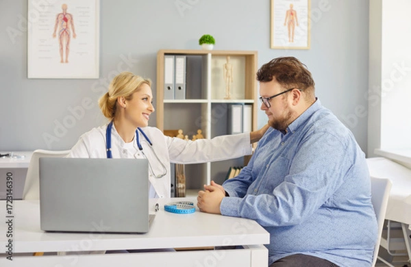 Fototapeta Doctor and patient consultation about obesity support. A friendly physician reassures a man, using empathy to encourage lifestyle changes for health. Supportive healthcare builds trust and hope.