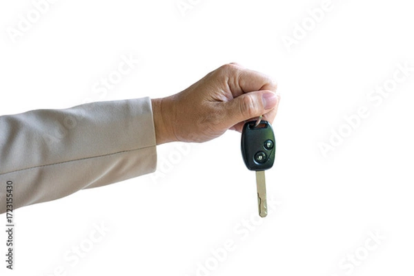 Fototapeta Man holding a car key, isolated on transparent background.