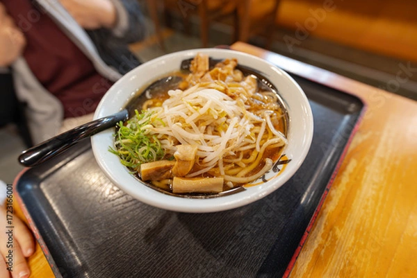 Fototapeta a clear pork broth soup ramen with bamboo shoots and fresh bean sprouts