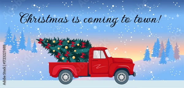 Fototapeta Red retro pickup with a Christmas tree in the back. Backdrop of a winter landscape. Christmas and New Year festive banner greeting card background. Inscription - Christmas is coming to town.