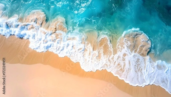 Fototapeta High-angle view of a beach, turquoise water, and foamy waves