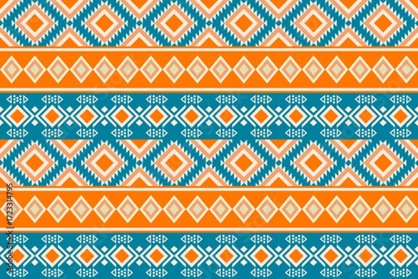 Fototapeta Colorful geometric ethnic seamless pattern with traditional tribal ornaments in orange, teal, and white. Perfect for textile design, fabric prints, wallpapers, and decorative backgrounds.