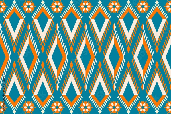 Fototapeta Colorful geometric ethnic seamless pattern with traditional tribal ornaments in orange, teal, and white. Perfect for textile design, fabric prints, wallpapers, and decorative backgrounds.