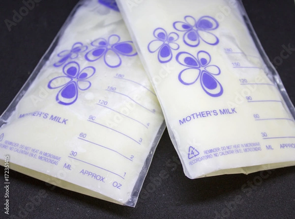 Fototapeta Pumped frozen breastmilk for feeding baby