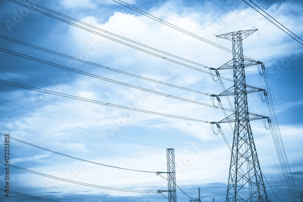 Fototapeta Electricity station. Close up high voltage power lines at sunset.