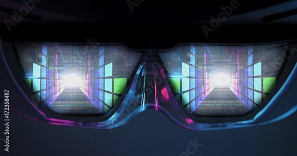 Fototapeta Interior view through VR glasses showing a vivid digital data tunnel with colorful light grids and bright white focal point, symbolizing cyberspace, immersive technology, and futuristic virtual journe