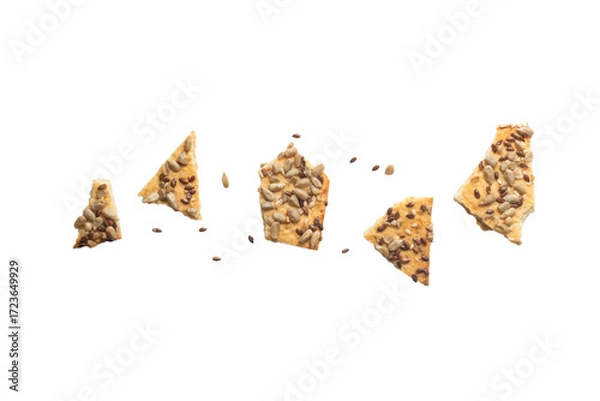 Fototapeta Stacked flax and sunflower seed cookies isolated on a white background are perfect for snack branding, packaging visuals,