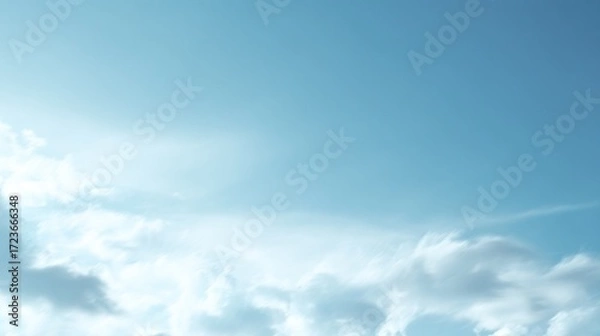 Fototapeta There are little white clouds in the beautiful blue sky, with plenty of blank space, showcasing exquisite details, suitable for various uses.