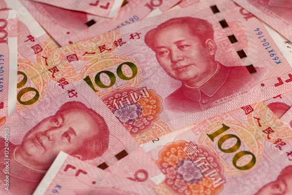 Fototapeta Chinese money with a face value of 100 yuan close up, a beautiful background of money used in China, obverse with portrait