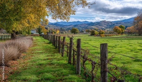 Obraz Autumnal rural landscape with a weathered fence