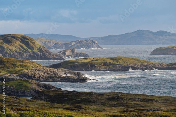 Fototapeta Atlantic waves crashing against the islands surrounding Badcall Bay by Scourie on the west coast of Scotland