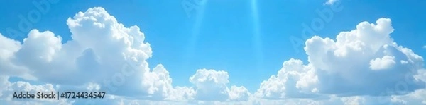 Fototapeta Vast expanse of fluffy white cumulus clouds against a brilliant blue summer sky, perfect for serene backgrounds  Ideal for travel, nature, and weather themes ,  overhead,  aerial view,  sunlight