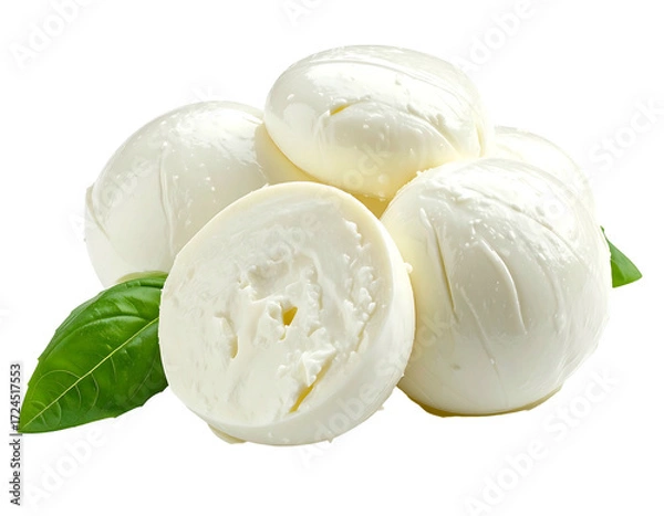 Fototapeta Fresh mozzarella balls, sliced, on basil leaves