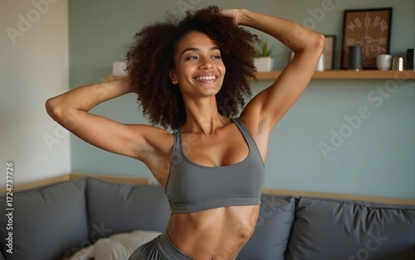 Fototapeta Determined multiethnic woman practicing abs exercise at home. High quality