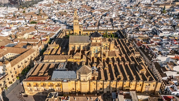 Fototapeta Aerial drone view of cityscape of Cordoba with Mosque-Cathedral, Mezquita Cathedral and skyline of Cordoba, Andalusia, Spain
