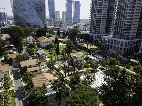 Fototapeta TEL AVIV, ISRAEL Cityscape with towers of Azrieli Center and Sarona area in Tel Aviv, . Azrieli center is the main landmark of Tel Aviv. Old and New Architecture in Tel Aviv - Old and modern bui