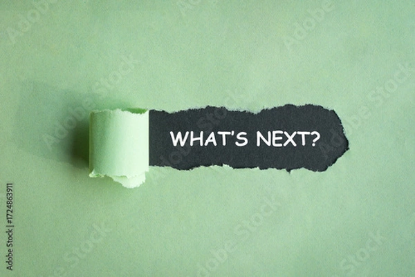 Fototapeta What is next, a question on dark surface behind a green paper hole. 