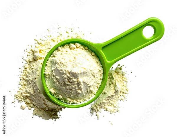Obraz Bright green measuring scoop filled with pale yellow flour, scattered around