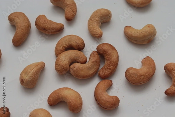 Obraz Cashews laying on white background 