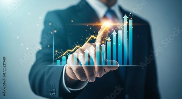 Fototapeta Businessman touching a growth chart with an arrow pointing upwards, representing business success and financial growth