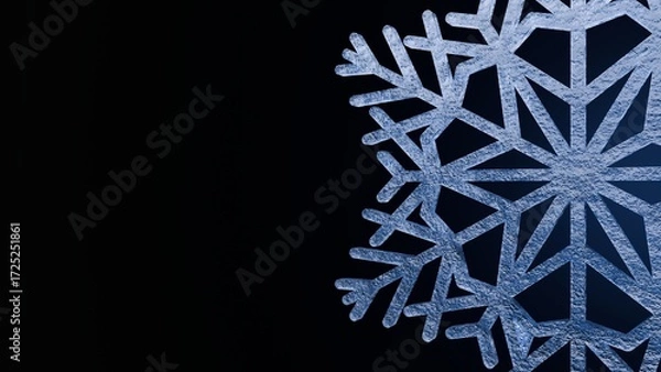 Fototapeta Half View Of Detailed Blue Snowflake On Black Background For Winter Cold Weather Christmas And Seasonal Decoration Concepts
