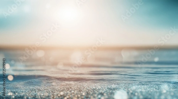 Fototapeta blurred background of the sea, light blue and white tones, sun shining on the water's surface, bokeh effect