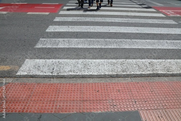 Obraz Tactile paving (tenji blocks) by the pedestrian crossing in Benidorm, Spain.