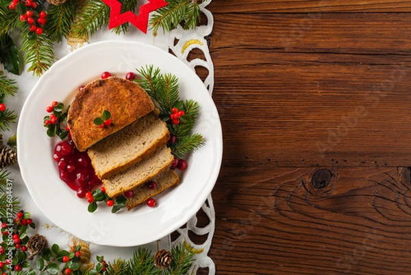 Fototapeta Small, baked patties in Christmas retro styling. Top view. Natural wooden background.