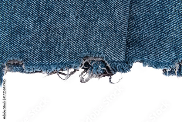 Fototapeta Piece of torn denim on a white background. Denim texture
