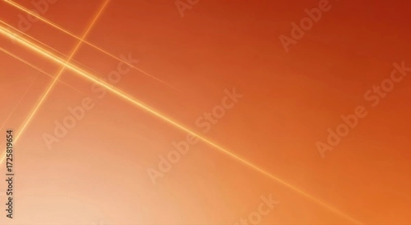 Fototapeta Abstract orange background with faint diagonal lines of light crossing the frame view