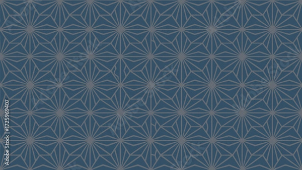 Fototapeta Geometric pattern featuring starbursts and triangular shapes on a blue background in a seamless design
