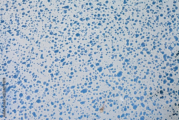 Fototapeta The first drops of water reach the surface of a dirty car requiring washing and cleaning, leading to corrosion and vehicle diagnostics at a service center