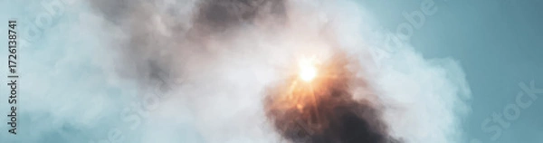 Fototapeta The sun shining through the smoke from forest fires is causing great tragedy for the environment and local residents, causing huge losses in millions of US dollars.