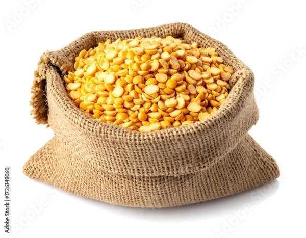 Fototapeta A burlap sack filled with yellow split peas against a white background