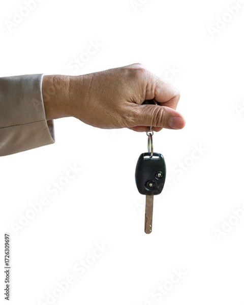 Fototapeta Man holding a car key, isolated on transparent background.