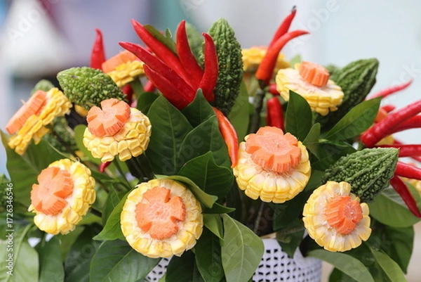 Fototapeta Flower vase made from vegetables and fruits