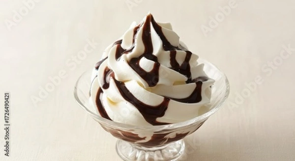 Fototapeta Delicious soft serve ice cream with chocolate syrup drizzle