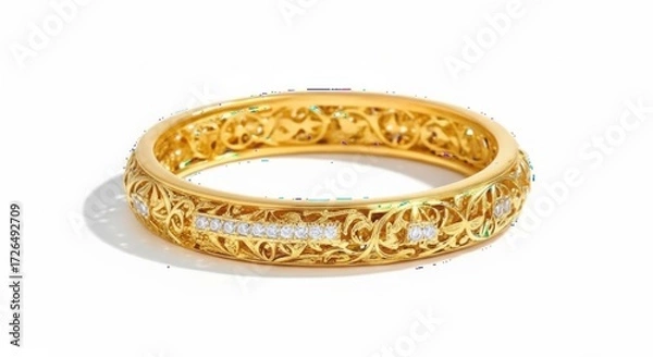 Fototapeta Ornate gold bangle bracelet with intricate filigree design