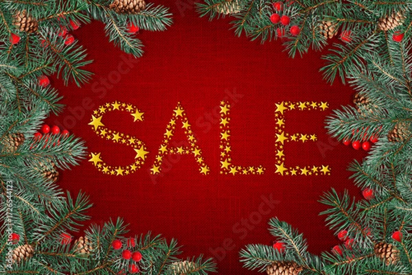 Fototapeta Christmas SALE banner with golden stars lettering on red fabric texture background, decorated with pine branches, cones and berries. Perfect for seasonal promotions and advertising.
