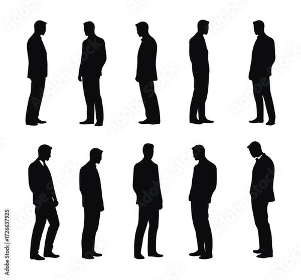 Fototapeta silhouette of a man in a suit working in an office