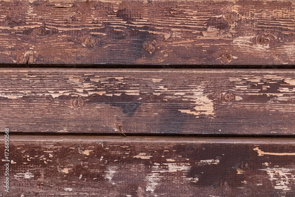 Fototapeta Brown wooden background made of old boards with scuffs. Natural wood texture. A copy of the space. layout for rustic theme design