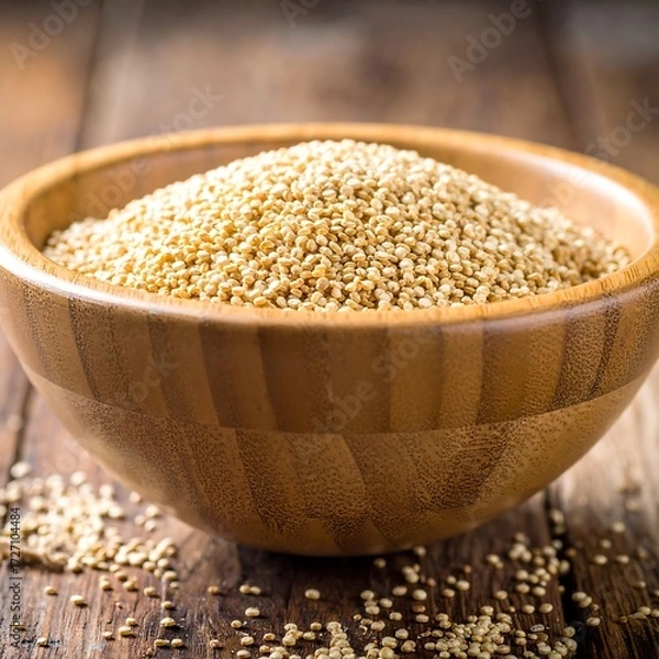 Fototapeta Quinoa in a wooden bowl