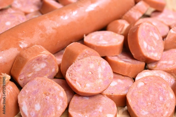 Obraz closeup of cut raw pepperoni sausages