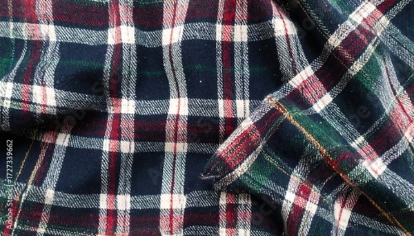Obraz Wrinkled, folded flannel cloth in plaid design, with shades of blue, white, red, and green