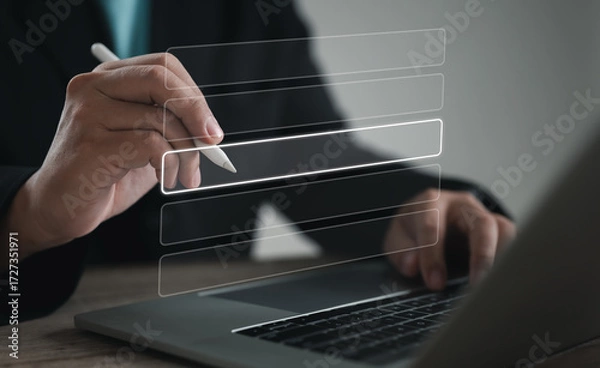 Fototapeta Professional using digital pen to select interface option on virtual screen, illustrating technology, innovation, online form, electronic document, business workflow, and modern user experience.